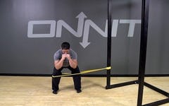 Lateral Band Resisted Squat Hold Bodyweight Exercise