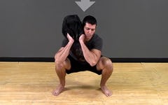 Sandbag Exercise: Shouldering Squat