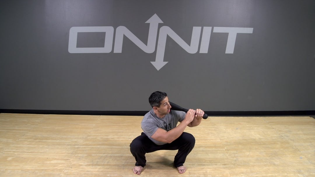 Steel Club Exercise: 2-Hand Side Shouldered Squat