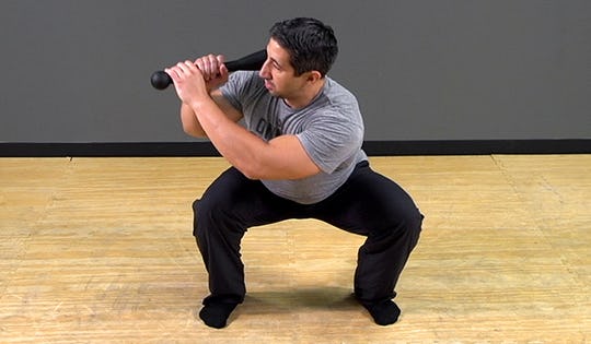 Steel Club Exercise: Clock Squat