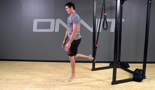 Suspension Exercise: 1-Leg Drop Step Explosive Ankle Touch