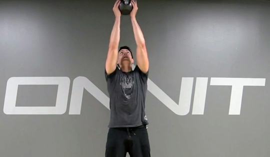 Mark de Grasse performs the Kettlebell 2-Hand Clean from Ground to Press