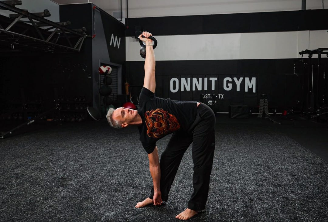 Shane Heins demonstrates the kettlebell windmill exercise.