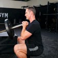 How To Do The Landmine Squat: Hack Squats, Goblet Squats, and More