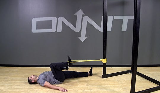 Band Resisted Lying Hip Flexion Bodyweight Exercise