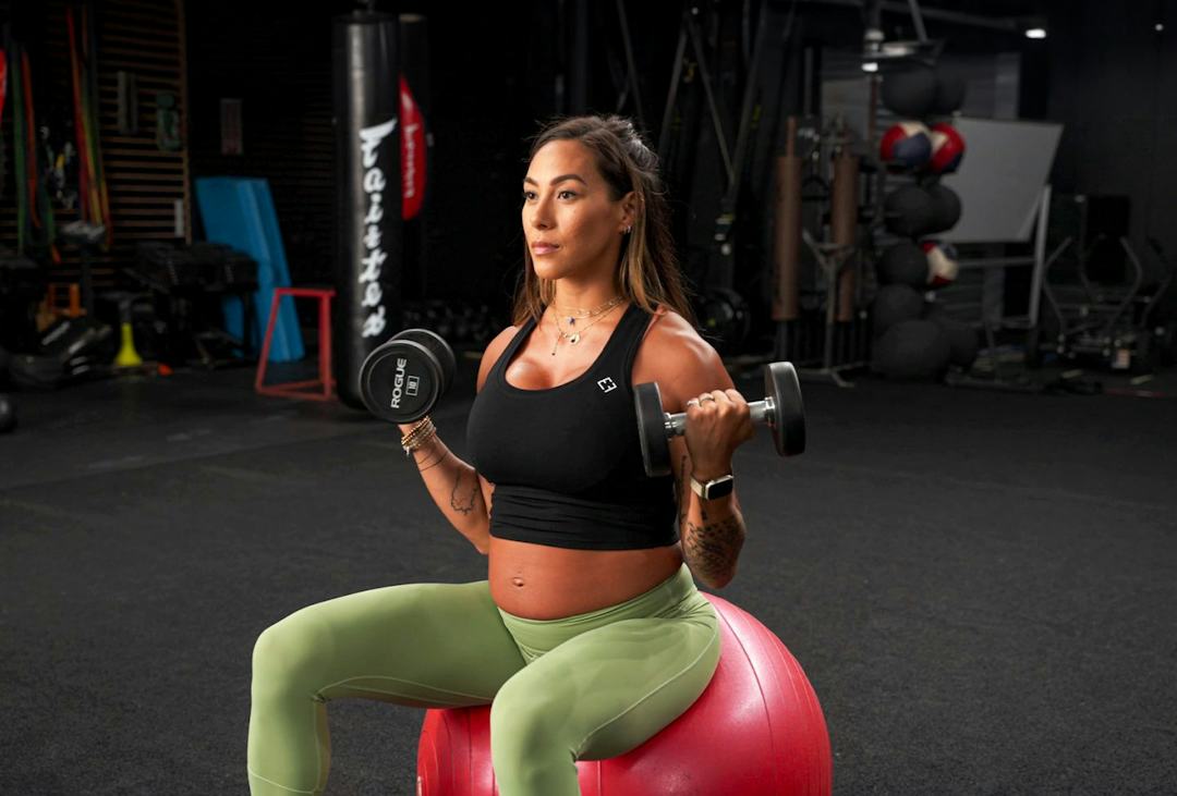 Hannah Eden demonstrates the Swiss-ball biceps curl